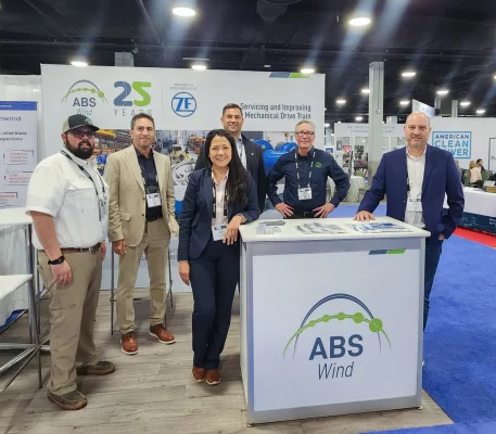 The ABS Wind team—Brent Kelly, Pablo Rodriguez, Keyli Mora, Philippe Rezayee, Steve Casey, and Nelson Carrodeguas—at the ABS Wind booth at the Operations, Maintenance & Safety Conference 2025 (OMS25).